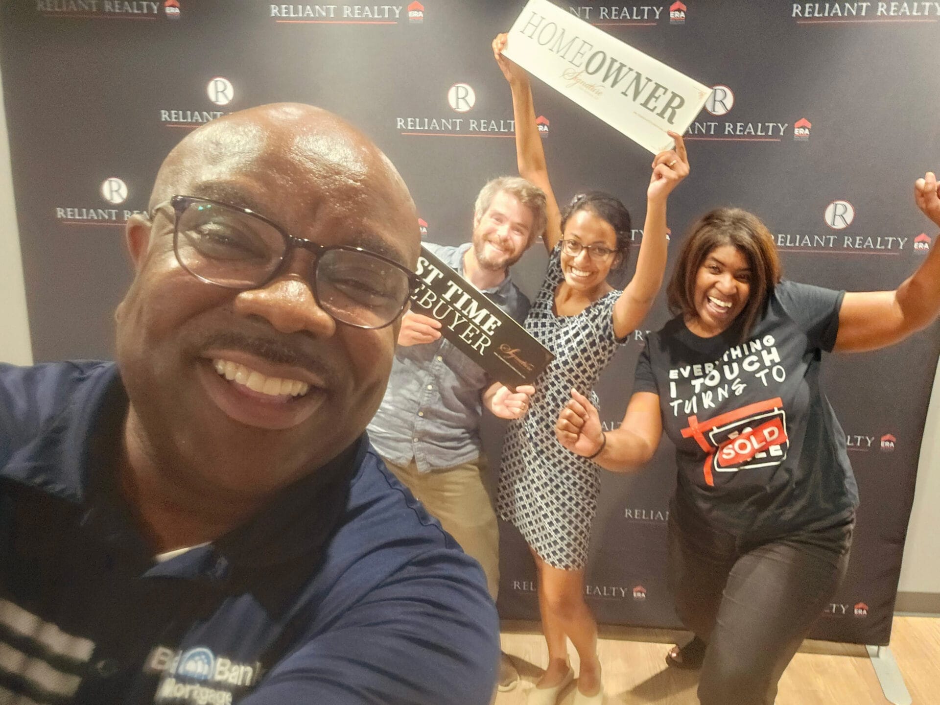 mortgage loan officer with realtor Diana Brooks and clients